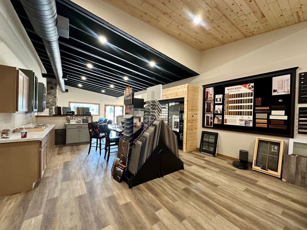Interior design showcase featuring cabinetry, flooring samples, and modern decor elements.